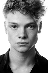 Profile picture of Tom Rhys Harries who plays Axel Collins