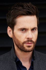 Profile picture of Tom Riley who plays Neil